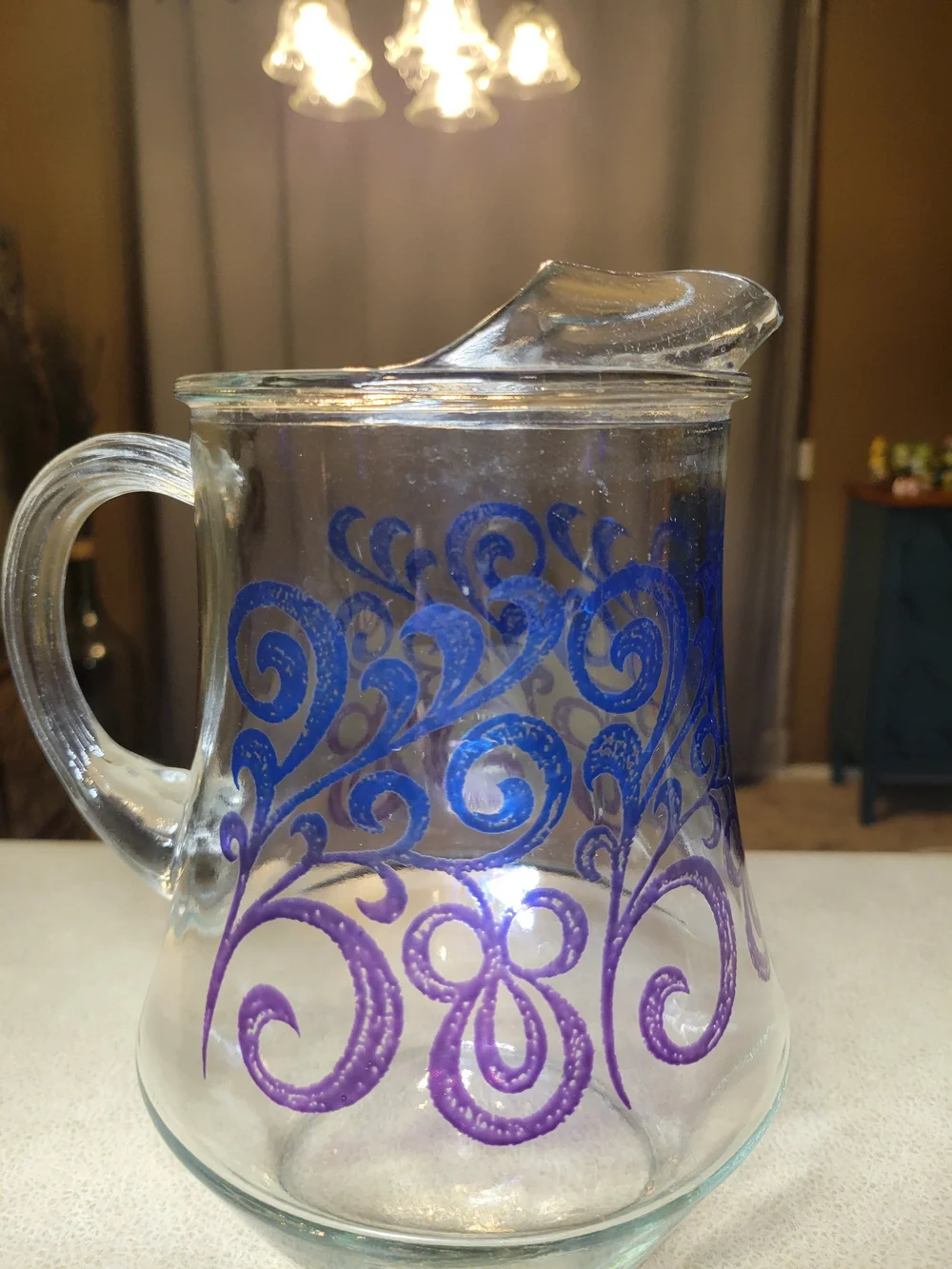 Vintage Glass Pitcher with Blue & Purple Scroll Design